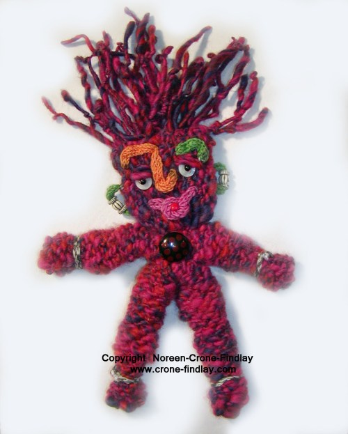 spool-knitted-handspun-pink-doll-finished