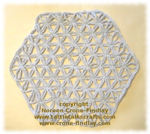 Flower of Life pattern woven on the hexagon loom by Noreen Crone-Findlay